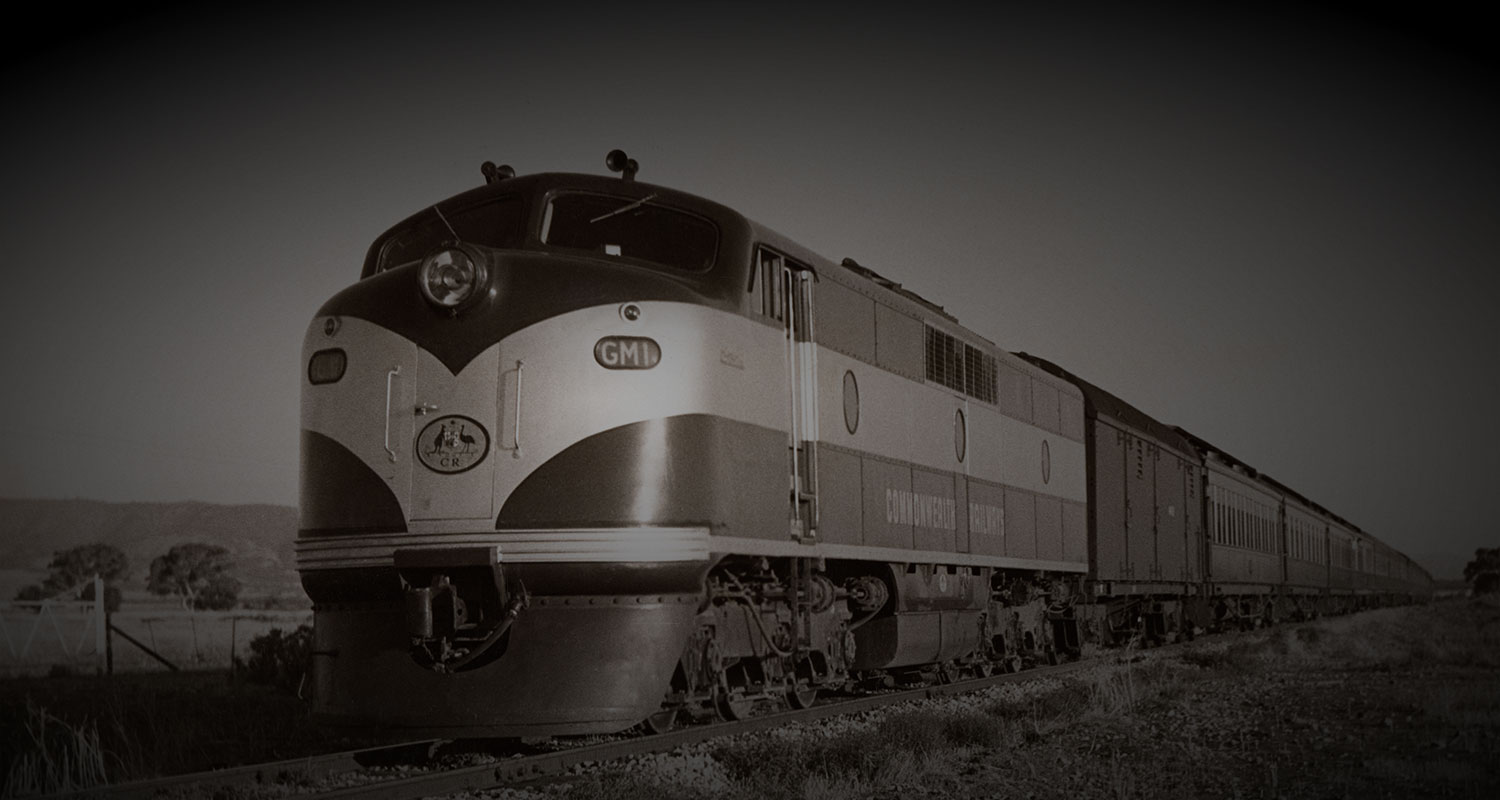 Diesel locomotive and carriages on Trans-Australian Railway