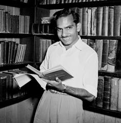 Yash Pal Bori of Punjab, India, seen here browsing through books in the Library of the Methodist King's College, 1955.
