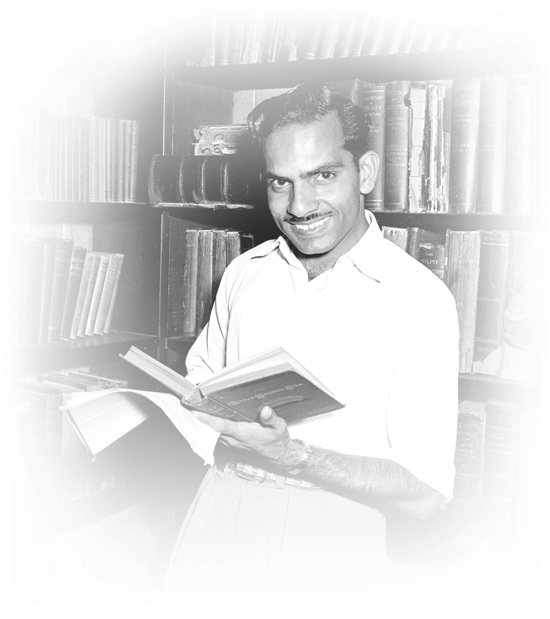 Yash Pal Bori of Punjab, India, seen here browsing through books in the Library of the Methodist King's College, 1955.