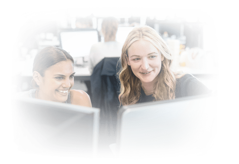 Two women working in office.