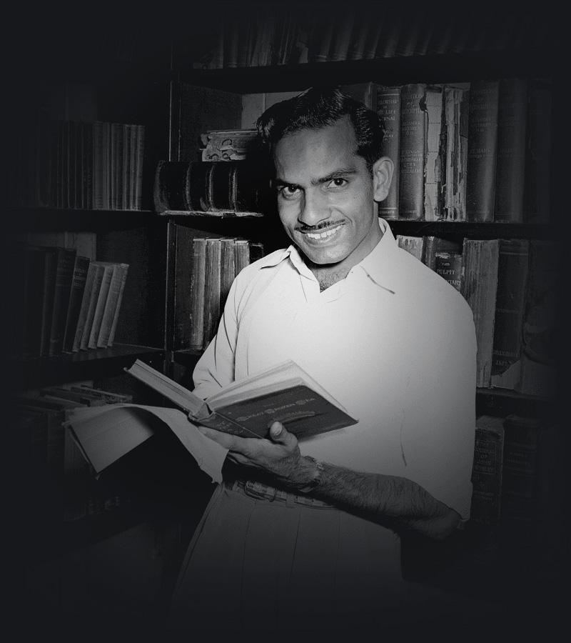 Yash Pal Bori of Punjab, India, seen here browsing through books in the Library of the Methodist King's College, 1955.