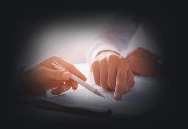 Business people negotiating a contract