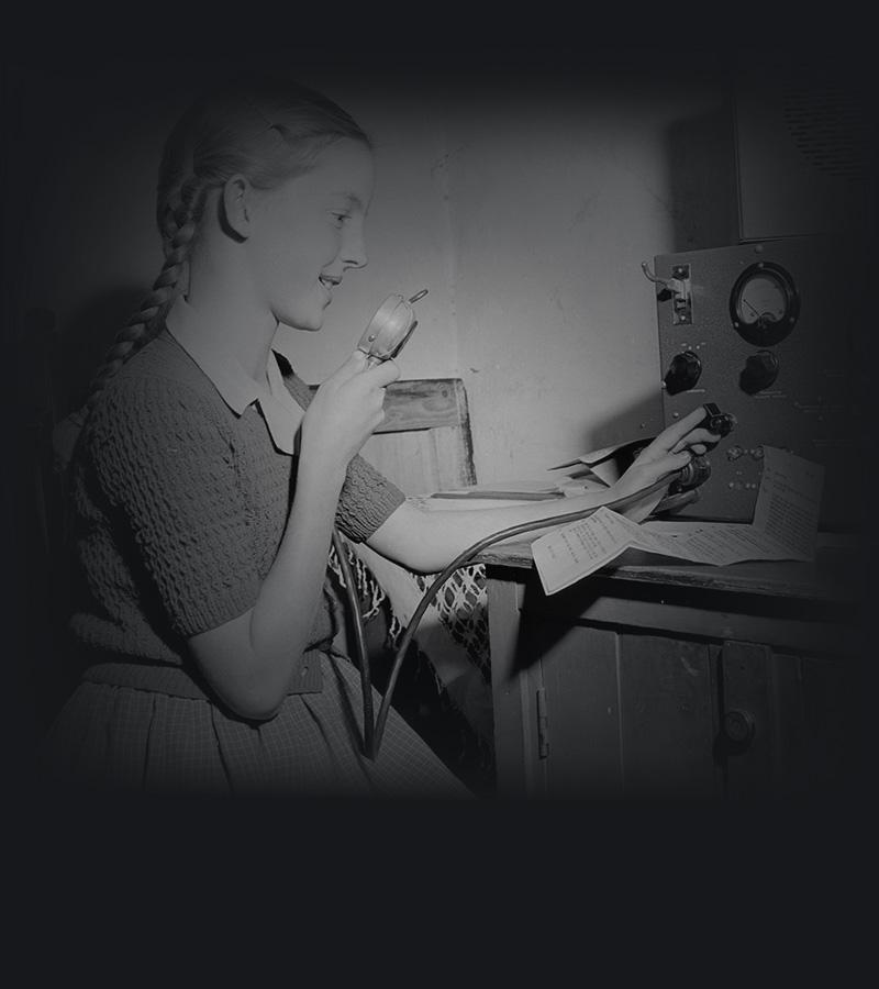 A schoolgirl talking over the radio.
