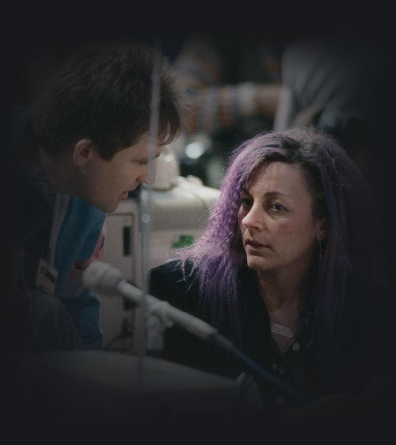 Two people talking.