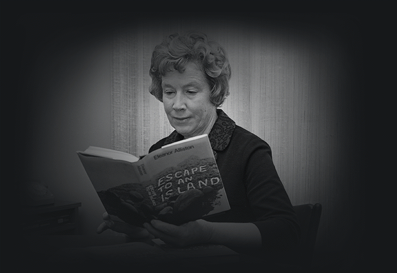 There at Three Humock Island on the 40th parallel, they became a modern day Swiss Family Robinson. Recently Mrs Alliston had a book published on the family's adventures on their island. Authoress, Mrs Eleanor Alliston, reading her first book, "Escape to an Island", which tells of her family's life on Three Humock Island.