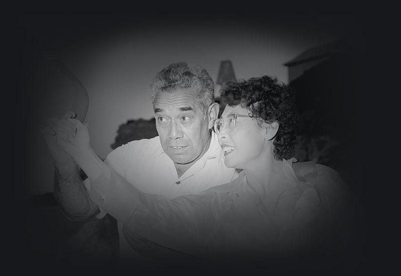 Mrs Yun Ho Hong, Deputy Director of Junior Red Cross in the Republic of Korea being shown how to throw a boomerang by Australian Aborigine, Mr William Onus