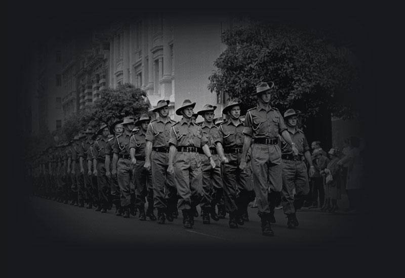 A photograph of an Anzac Day march, Saint George's terrace in Perth.