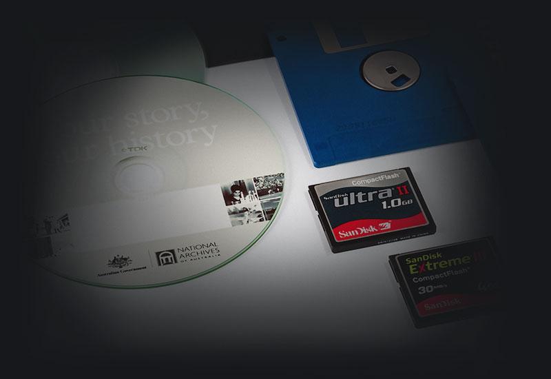 A DVD, compact flexible disc and Compact Flash (CF) card.