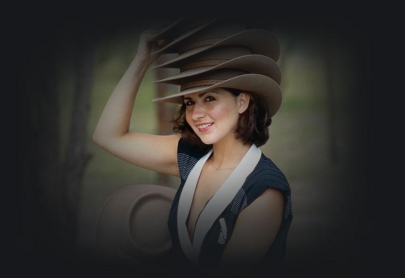 A model wearing 7 Akubra hats