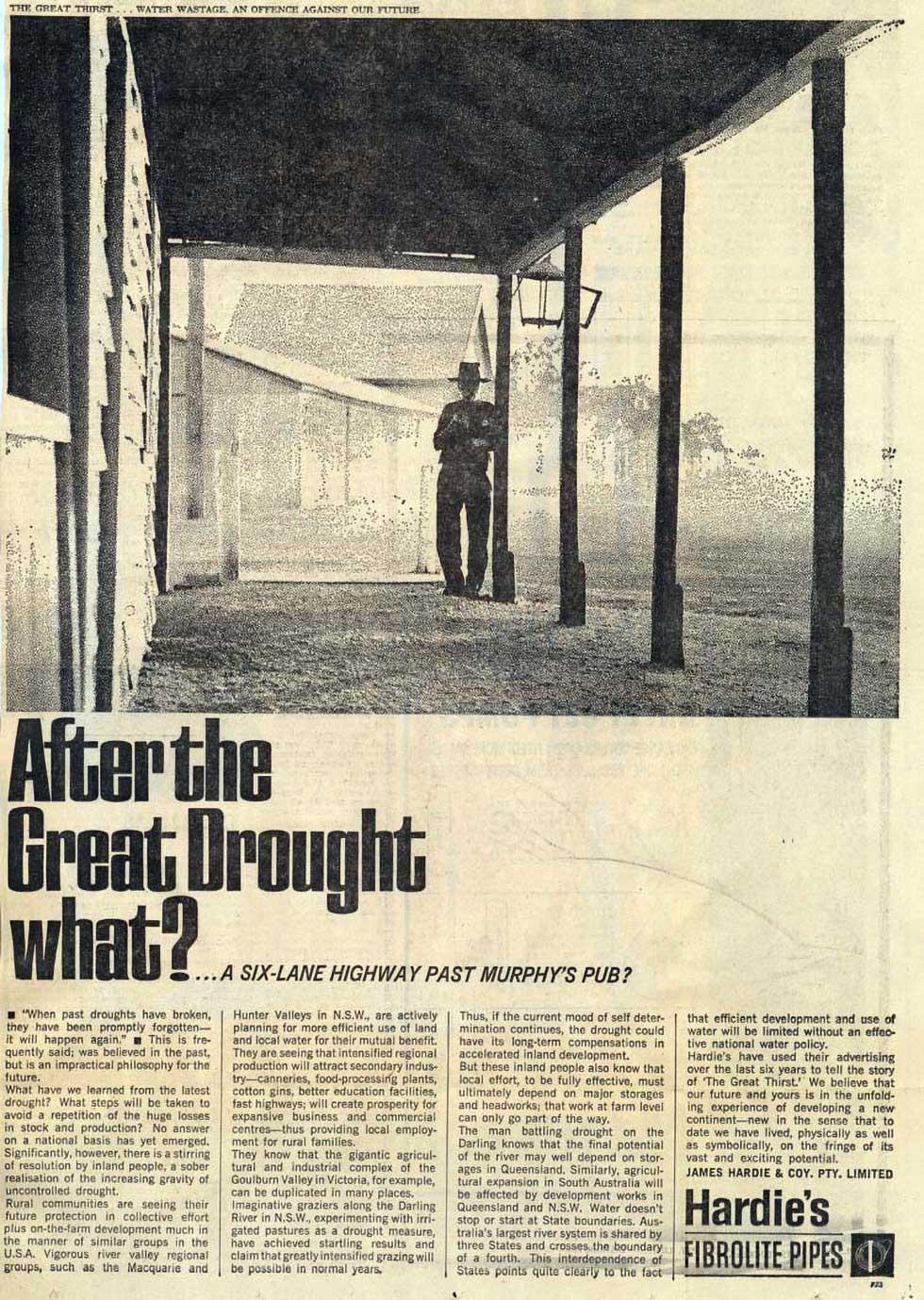 Man standing under a large verandah with dirt floor.