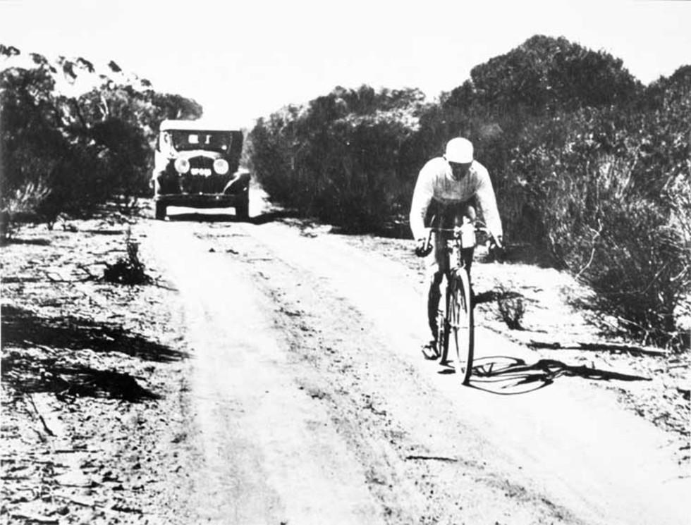 Sportsman and politician Hubert Opperman cycling across Australia.