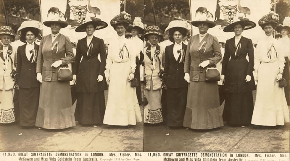 Stereoscopic photograph of Margaret Fisher (centre) with Emily McGowen, Vida Goldstein, Lady Cockburn (wife of South Australian Premier) and Lady Stout (wife of former New Zealand Prime Minister) lead marchers bearing Australia's Coat of Arms in the 1911 suffrage demonstration in London. By permission National Library of Australia Pic/6941