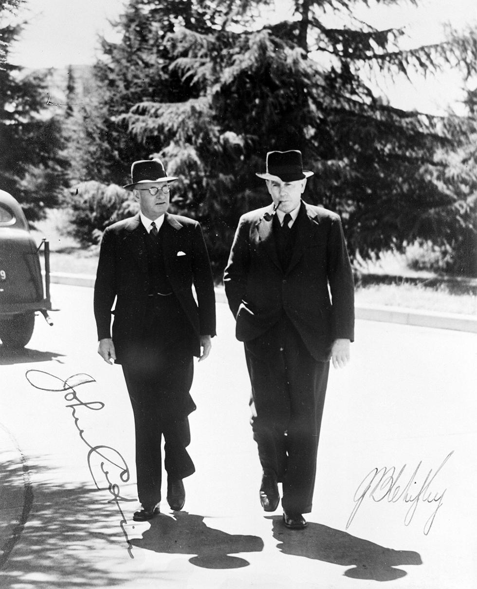 Firm friends, Prime Minister John Curtin and Treasurer Ben Chifley work as they walk to Parliament House. NAA: A1200, L26035