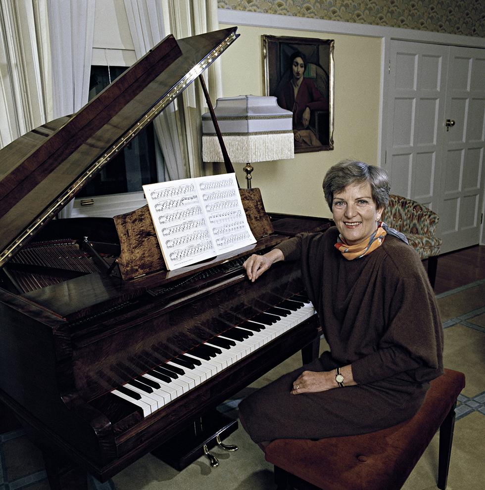 Hazel Hawke in the drawing room at The Lodge in 1986, with the restored piano originally bought for The Lodge in 1927.