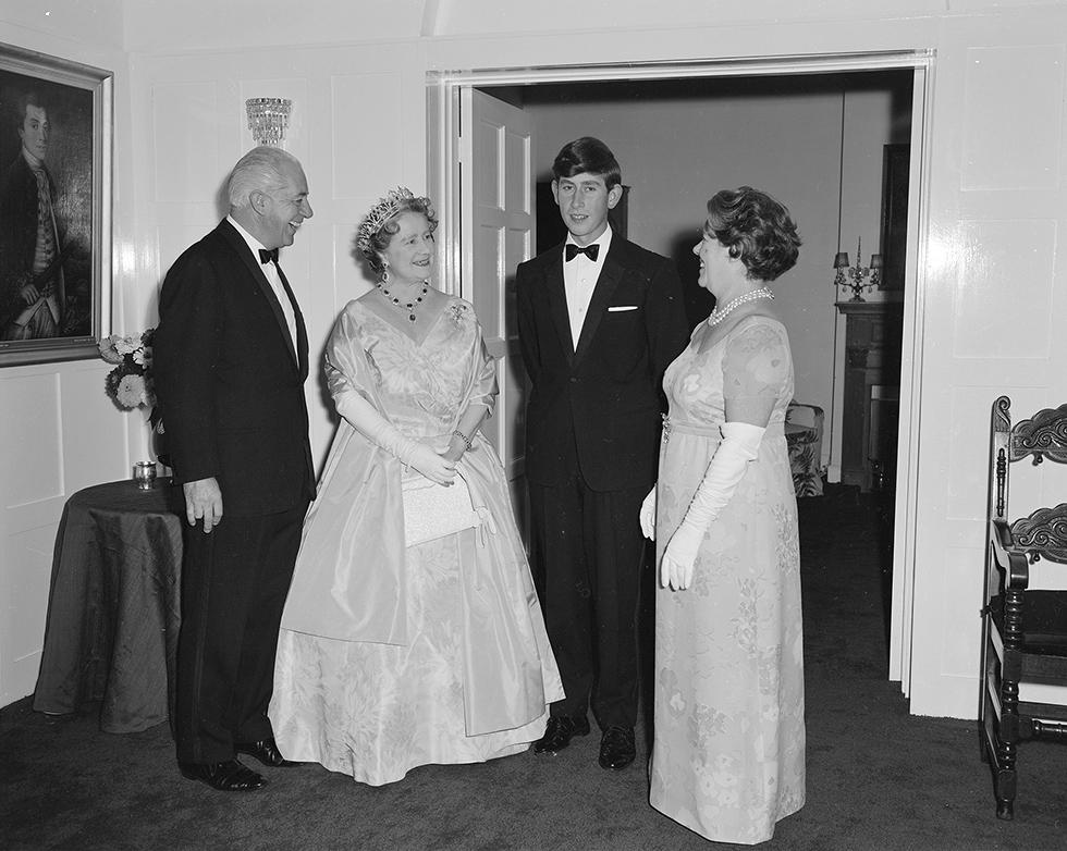 Prime Minister Harold Holt and Zara Holt welcome Queen Elizabeth the Queen Mother and Prince Charles to dinner at The Lodge on Sunday, 3 April 1966.