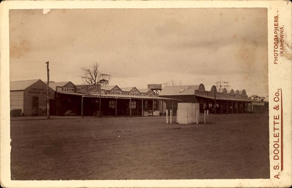 A row of buildings including dining room and store 