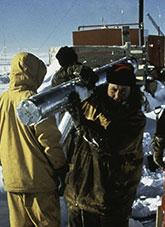 Carrying ice cores to ice core pit, Antarctic. NAA: B4498, 193E1, 9723297