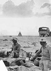 Soldiers getting ready at dawn in the Western Desert, January 1941.