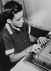Blind high school boy, Ken Todd of Brisbane with braille typewriter