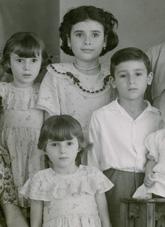 Family portrait of a Maltese family.