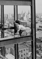 Men working on a hi rise building.