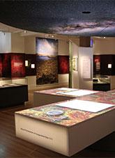 Gallery exhibits under image of the Milky Way