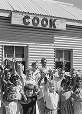 Schoolchildren wave goodbye to the Indian Pacific during a stop on its inaugural run 1970.