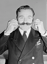 Ship's waiter Leslie Young from Exmouth, Devon, headwaiter in Strathnaver. Leslie Young, 37 from Devon, head waiter in Strathnaver.