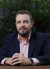 Outdoor portrait of Troy Bramston by John Feder