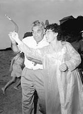 Mrs Yun Ho Hong, Deputy Director of Junior Red Cross in the Republic of Korea being shown how to throw a boomerang by Australian Aborigine, Mr William Onus