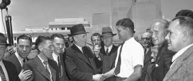 Prime Minister Ben Chifley and Immigration Minister Arthur Calwell greet postwar migrants.