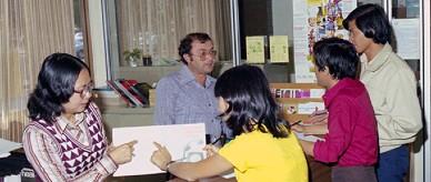 This is a photograph of migrants receiving support at the International Club of Victoria.