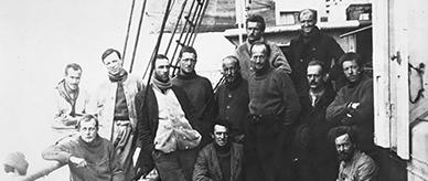 Black-and-white photograph of Douglas Mawson with the rescue party returning to Australia.
