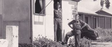 Laszlo Makay and another man in uniform as camp patrolmen at Bonegilla Migrant Centre. 