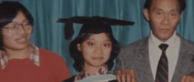 Noonee Doronila in graduation cap.