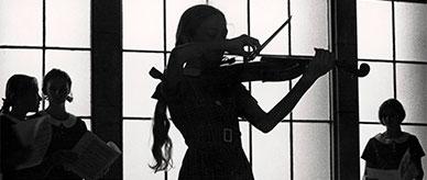 Silhouette of a violinist.