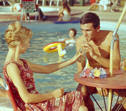 Family dining next to the motel pool.