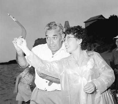Mrs Yun Ho Hong, Deputy Director of Junior Red Cross in the Republic of Korea being shown how to throw a boomerang by Australian Aborigine, Mr William Onus
