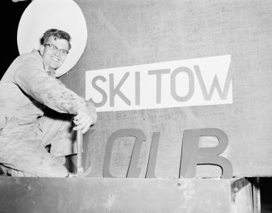 Photograph of Gerard van Wezel working on a Festival of the Snows float, 1958.