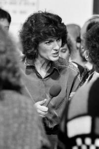 Geraldine Doogue interviewing people.