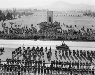 Crowd and military in front of Parliament House.