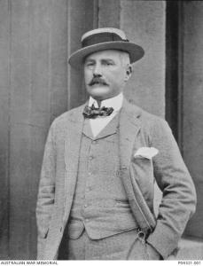 Umphelby wearing a boater, bow tie and 3 piece suit.