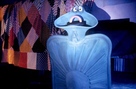 Alfred beside the bed quilt