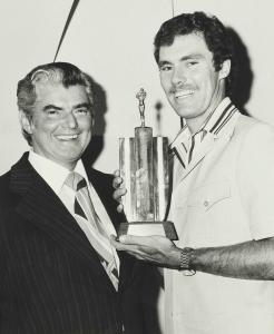 A sportsman holding a trophy