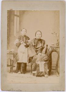 Studio portrait of Mrs Lih Moon and her daughter.