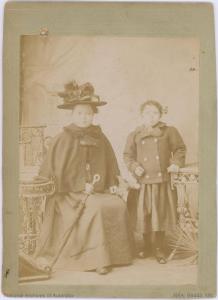 Studio portrait of Mrs Lih Moon and her daughter.