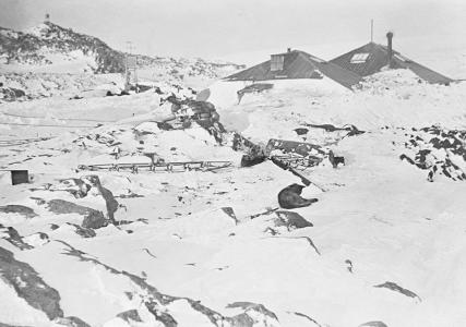 Huts engulfed in snow and ice.