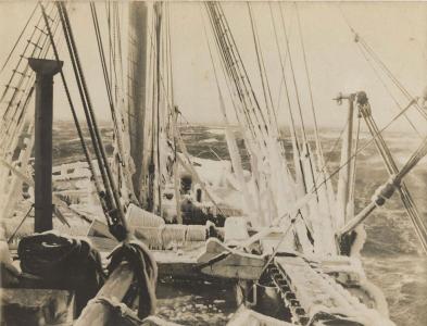 Ship deck and rigging ecrusted with ice.