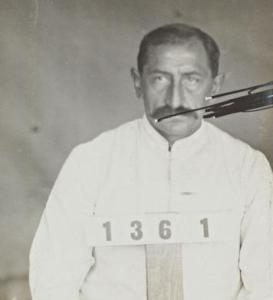 Robert holding his internment number 1361.