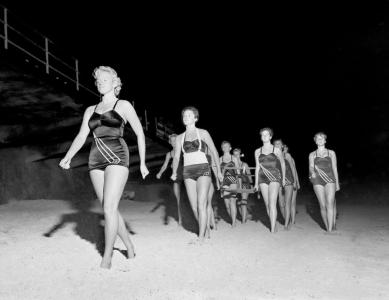 Surf lifesaving women marching on Narrabeen beach